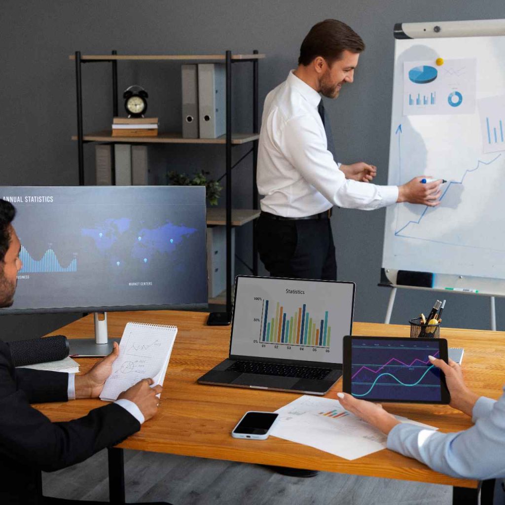 business-person-looking-finance-graphs (1)