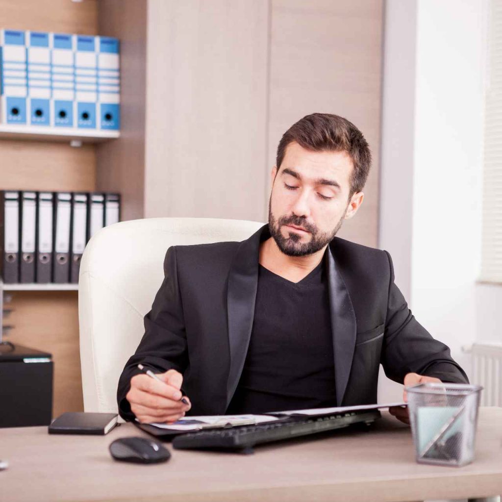 businessman-working-his-office-businessperson-professional-environment (1)